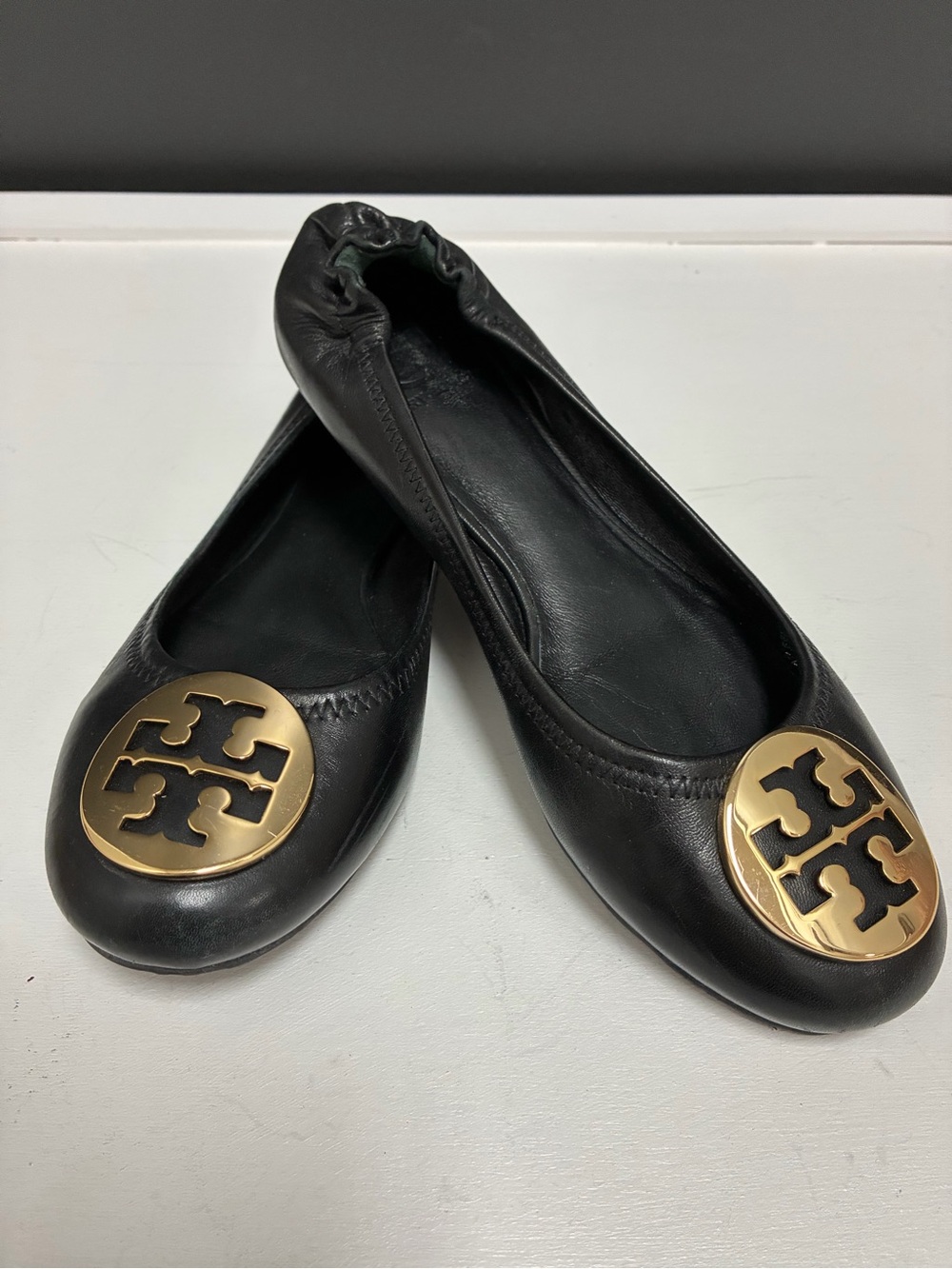 Tory Burch Black Leather Logo Ballet Flats with Gold Emblem